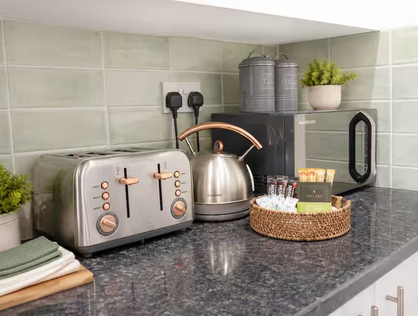 Complimentary tea and coffee station with kettle, toaster and microwave